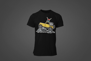 A black tee shirt with the image of a Jeep Gladiator climbing a mountain.